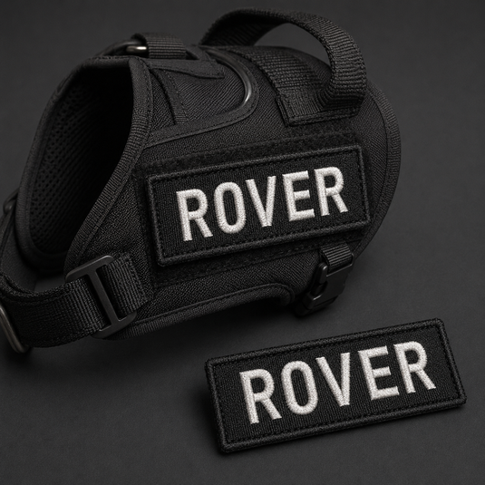Pair of black personalised dog harness name patches embroidered with ROVER
